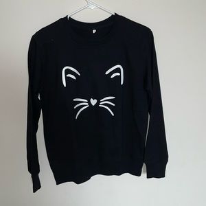 I’m not sure where I got this. guessing Walmart. But it’s small cat sweatshirt